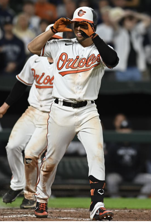 With bat and glove, Urías leads Orioles over Yankees 7-6